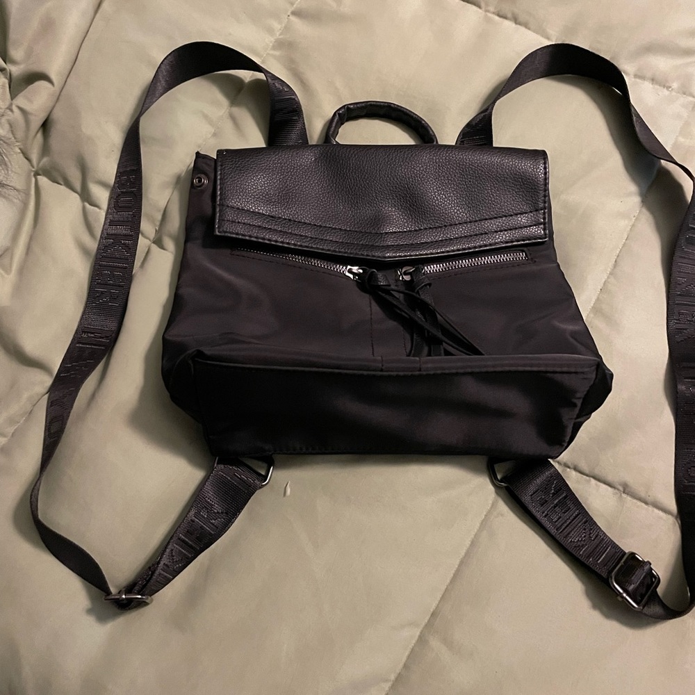 Botkier Small Backpack. Leather closing flap.